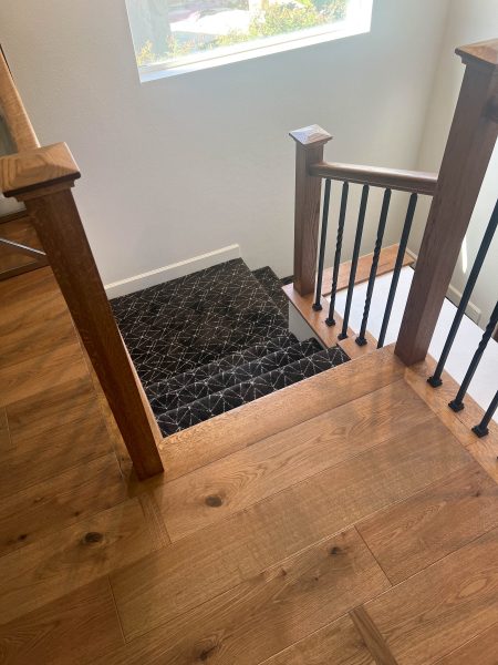 Engineered-Hardwood-Staircase-with-Dark-Carpet