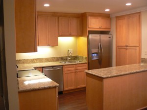 kitchen remodeling contractor installed undercounter lights to provide task lighting in small kitchen