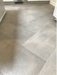 large tile in herringbone pattern