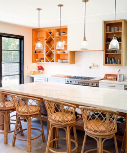 Orange County kitchen renovation after with white counters, warm shelves and bamboo barstools