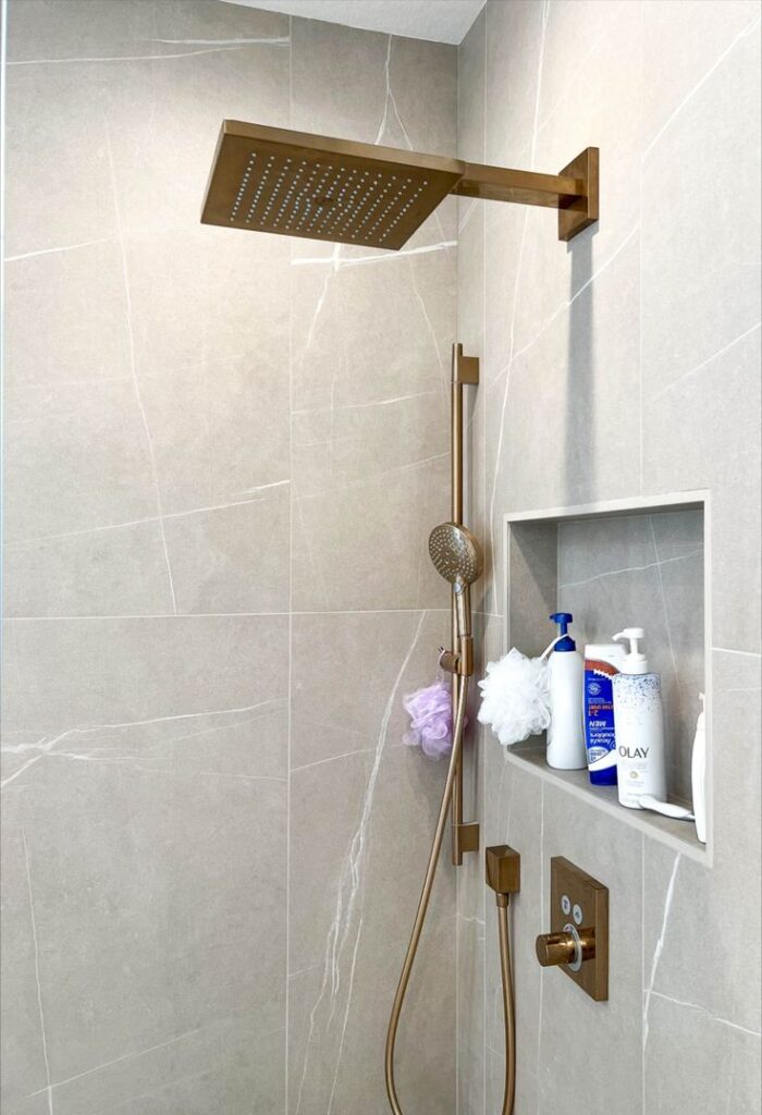 shower remodel adds rain shower head and adjustable height handheld shower