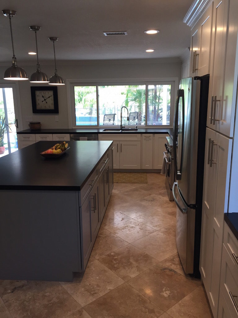 kitchen renovation contractor leaves ample aisle space between island and appliance wall